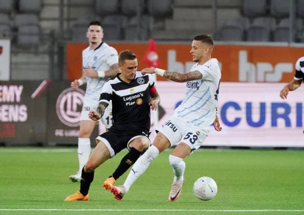 Anton Geisser 23 07 2024 Thun Switzerland Football Men 2024 2025 Qualification UEFA Champions League FC Lugano Fenerbahce SK Istanbul Picture Sebastian Szymanski Fenerbahce SK vs Mattia Bottani FC Lugano I Duel Action