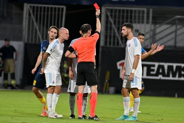 Celje, Slovenia, 24th 2024: Red card for Kyriakos Savvidis of Slovan Bratislava during the UEFA Champions League 2nd qualifying round football match between Celje (Slovenia) and Slovan Bratislava (Slovakia) at Stadium Celje, Celje, Slovenia. (Igor Kupljenik SPP) Copyright: xIgorxKupljenikx xSPPx spp-en-IgKuSp-IK0_1382