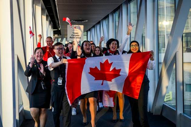 July 24, 2024, Toronto, On, Canada: Members of Air Canada and the 2024 Canadian Olympic Team celebrate as they arrive at Pearson Airport prior to boarding a flight to Paris for the 2024 Paris Olympics, in Toronto on Wednesday, July 24, 2024. Canada News - July 24, 2024  - ZUMAc35_ 20240724_zaf_c35_090 Copyright: xChristopherxKatsarovx