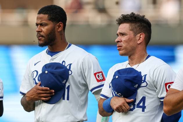 July 24, 2024: Kansas City Royals third baseman Maikel Garcia (11) and Kansas City Royals designated hitter Freddy Fermin (34) stand during the National Anthem before the game against the Arizona Diamondbacks at Kauffman Stadium in Kansas City, MO. CSM Kansas City United States of America - ZUMAc04_ 20240724_zma_c04_263 Copyright: xDavidxSmithx