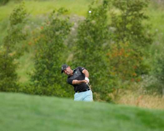 25th July 2024; JCB Golf &amp; Country Club, Rocester, Uttoxeter, England; LIV UK Golf League, Pro-Am Day; Charl Schwartzel of the Stinger GC plays from the rough on the sixteenth hole during the Thursday Pro-Am  ActionPlus12671557 StevenxFlynn