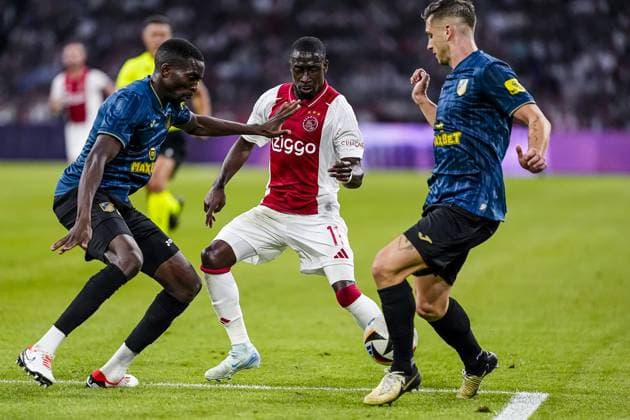 AMSTERDAM , 25-07-2024,JohanCruijff ArenA , Season 2024-2025. UEFA Europa League Second qualifying round Football between Ajax and Vojvodina, Ajax player Carlos Borges, Vojvodina player Mihai Butean Ajax - Vojvodina  x25835242x Copyright: