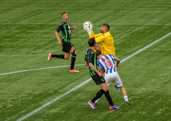 Cercle Brugge goalkeeper Warleson appears to make contact with Matty Kennedy of Kilmarnock inside the Brugge penalty area before he catches the ball. Referee Martin Dohal never gave a penalty kick. Kilmarnock v Cercle Brugge, UEFA Europa League, 2nd Qualifying Round, Football, The BBSP Stadium Rugby Park, Kilmarnock, UK, 25 Jul 2024 EDITORIAL USE ONLY No use with unauthorised audio, video, data, fixture lists, club league logos or live services. Online in-match use limited to 120 images, no video emulation. No use in betting, games or single club league player publications. Copyright: xStuartxWallace Shutterstockx 14602352cg