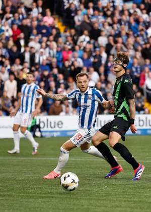 Kilmarnock v Cercle Brugge UEFA Europa League Edgaras Utkus of Cercle Brugge clears the ball under pressure from Bruce Anderson of Kilmarnock during the UEFA Europa League Second Qualifying Round First Leg match at Rugby Park, Kilmarnock UK Newspapers OUT Copyright: xFredxPalmerx FIL-20396-0137