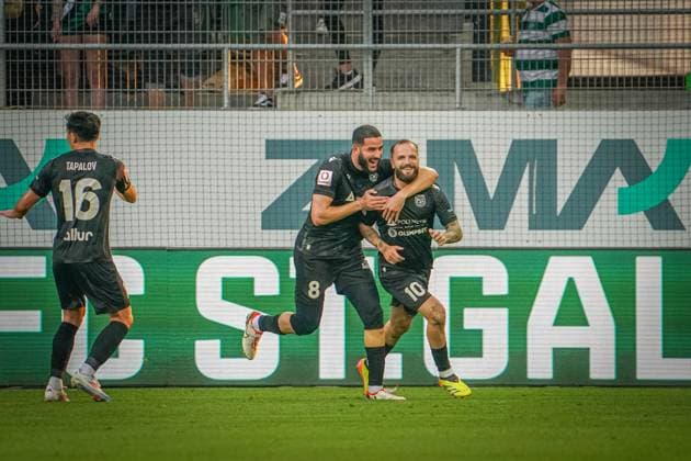 Soccer FC St Gallen 1879 vs FC TOBOL KOSTANAY 2 qualifying round UEFA Conference League Kybunpark St Gallen, Switzerland Tobol take a 1-0 lead through a St Gallen own goal, to the delight of Tobols Igor Ivanovic and Tobols Ahmed El Messaoudi with Tobols Yerkin Tapalov St Gallen Kybunpark Canton St Gallen Switzerland Copyright: xJoeranxSteinsiekx