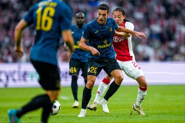 AMSTERDAM , 25-07-2024, JohanCruijff ArenA , Season 2024-2025. UEFA Europa League Second qualifying round Football between Ajax and Vojvodina , Vojvodina player Vukan Savicevic and Ajax player Kian Fitz-Jim Ajax - Vojvodina  x25837955x Copyright: