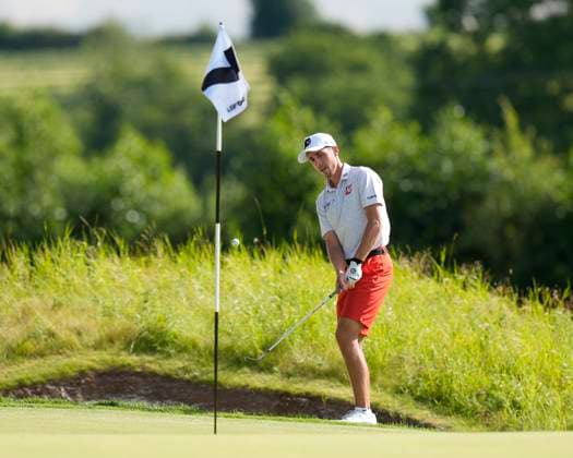 26th July 2024; JCB Golf &amp; Country Club, Rocester, Uttoxeter, England; LIV UK Golf League, Round 1; David Puig of the Fireballs GC chips to the 7th green during round one  ActionPlus12672156 StevenxFlynn