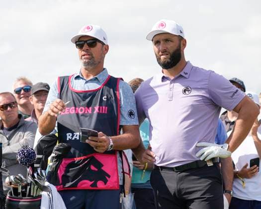 26th July 2024; JCB Golf &amp; Country Club, Rocester, Uttoxeter, England; LIV UK Golf League, Round 1; Jon Rahm of the Legion XIII GC checks the yardage with his caddy during round one  ActionPlus12672367 StevenxFlynn