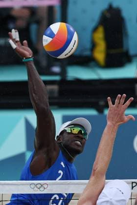 (240727) -- PARIS, July 27, 2024 -- Jorge Luis Alayo Moliner of Cuba competes during the men s pool D Beach volleyball, Beachvolleyball match between the United States and Cuba at the Paris 2024 Olympic Games, Olympische Spiele, Olympia, OS in Paris, France, on July 27, 2024. Huang Zongzhi) (PARIS2024)FRANCE-PARIS-BEACH VOLLEYBALL-MEN S PRELIMINARY huangzongzhi 