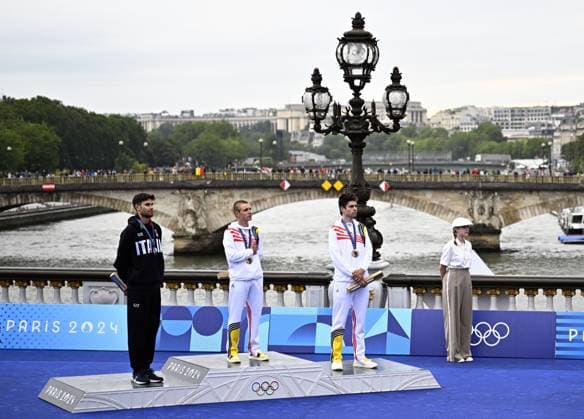 Italian silver medallist Filippo Ganna, Belgian gold medallist Remco Evenepoel and Belgian bronze medallist Wout van Aert pictured during the podium ceremony of the men s time trial cycling event at the Paris 2024 Olympic Games, Olympische Spiele, Olympia, OS on Saturday 27 July 2024 in Paris, France . The Games of the XXXIII Olympiad are taking place in Paris from 26 July to 11 August. The Belgian delegation counts 165 athletes in 21 sports. JASPERxJACOBS  x97168751x