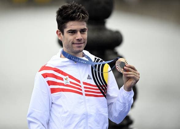 Belgian bronze medallist Wout van Aert pictured during the podium ceremony of the men s time trial event at the Paris 2024 Olympic Games, Olympische Spiele, Olympia, OS on Saturday 27 July 2024 in Paris, France . The Games of the XXXIII Olympiad are taking place in Paris from 26 July to 11 August. The Belgian delegation counts 165 athletes in 21 sports. JASPERxJACOBS  x97172241x