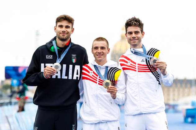 July 27, 2024, Paris, Paris, FRANCE: Silver medalist Filippo Ganna (ITA) , Gold medalist Remco Evenepoel (BEL), and Bronze medalist Wout van Aert (BEL) pose on the podium during the Men s Individual Time Trial on day one of the Olympic Games, Olympische Spiele, Olympia, OS Paris 2024 at Pont Alexandre III during the Paris 2024 Olympics Games on july 27, 2024, in Paris, Spain. Paris FRANCE - ZUMAa181 20240727_zaa_a181_368 Copyright: xManuxReinox