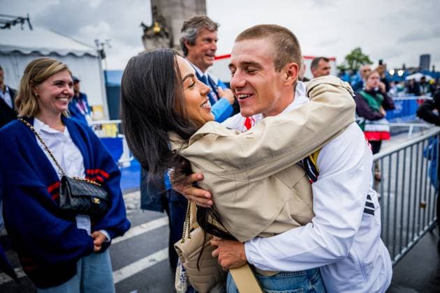 Belgian Remco Evenepoel embraces his wife Oumaima Oumi Rayane after winning the men s time trial event at the Paris 2024 Olympic Games, Olympische Spiele, Olympia, OS on Saturday 27 July 2024 in Paris, France . The Games of the XXXIII Olympiad are taking place in Paris from 26 July to 11 August. The Belgian delegation counts 165 athletes in 21 sports. JASPERxJACOBS  x97177136x