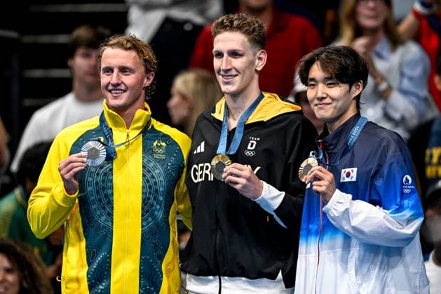 Elijah Winnington of Australia, silver, Lukas Martens of Germany, gold, Woomin Kim of Korea, bronze, show the medals after competing in the swimming 400m Freestyle Men Final during the Paris 2024 Olympic Games, Olympische Spiele, Olympia, OS at La Defense Arena in Paris (France), July 27, 2024. Giorgio Scala