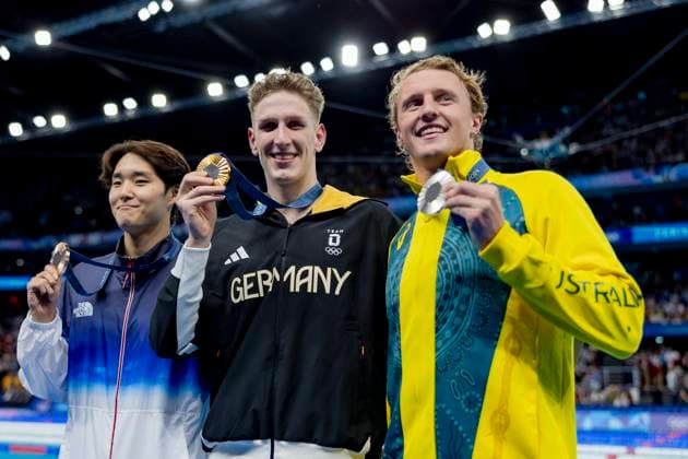 Paris, France 27 07 2024 Swimming Finals, Day 1, Woomin Kim, KOR, Lukas Maertens, GER, Elijah Winnington, AUS Photo by JoKleindl Paris Copyright: xJoKleindlx