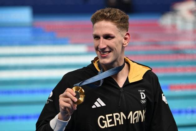 27th July 2024; Paris Olympic Games, Olympische Spiele, Olympia, OS Paris, France, Day 2; Swimming, Aquatics Centre, Arena De La Defense, Mens 400m freestyle final, Lukas Maertens of Germany receives the Gold Medal  ActionPlus12673081 SimonxWest