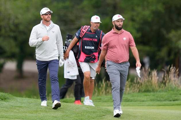 27th July 2024; JCB Golf &amp; Country Club, Rocester, Uttoxeter, England; LIV UK Golf League, Round 2; Andy Ogletree of the Highflyers GC and Jon Rahm of the Legion XIII GC walk onto the 18th green during round two  ActionPlus12673219 StevenxFlynn