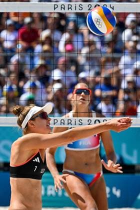 Olympic Games Beach Volleyball Paris 28 07 2024 Preliminary round, women, GER FRA Svenja Mueller, in the set, Aline Chamereau in the back, Copyright: xBEAUTIFULxSPORTS TomxBlochx