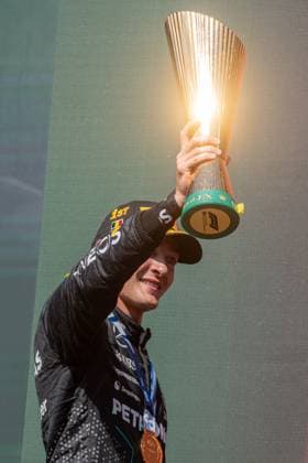 Mercedes-AMG Petronas UK rider George Russell celebrates on the podium after winning the Grand Prix F1 of Belgium race, in Spa-Francorchamps, Sunday 28 July 2024. The Spa-Francorchamps Formula One Grand Prix takes place this weekend, from July 25th to July 28th. JONASxROOSENS  x97245426x