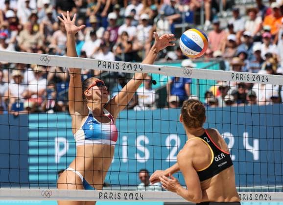 (240728) -- PARIS, July 28, 2024 -- Aline Chamereau (L) of France blocks the ball from Cinja Tillmann of Germany during the women s pool C Beach volleyball, Beachvolleyball match between Germany and France at the Paris 2024 Olympic Games, Olympische Spiele, Olympia, OS in Paris, France, on July 28, 2024. Yang Lei) (PARIS2024)FRANCE-PARIS-OLY-BEACH VOLLEYBALL yanglei 