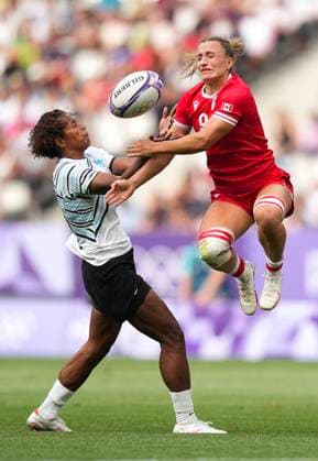 July 28, 2024, Paris, FRANCE: Canada forward Krissy Scurfield (9) battles for the loose ball against Fiji forward Laisana Likuceva (10) during second half Women rugby 7s rugby action at the Paris Summer Olympics in Paris, France on Sunday, July 28, 2024. Canada News - July 28, 2024  - ZUMAc35_ 20240728_zaf_c35_047 Copyright: xNathanxDenettex