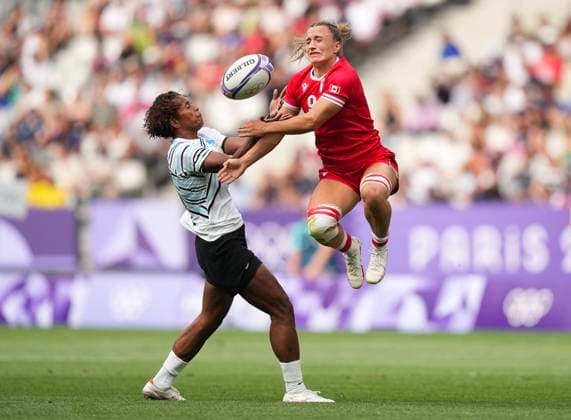 July 28, 2024, Paris, FRANCE: Canada forward Krissy Scurfield (9) battles for the loose ball against Fiji forward Laisana Likuceva (10) during second half Women rugby 7s rugby action at the Paris Summer Olympics in Paris, France on Sunday, July 28, 2024. Canada News - July 28, 2024  - ZUMAc35_ 20240728_zaf_c35_048 Copyright: xNathanxDenettex