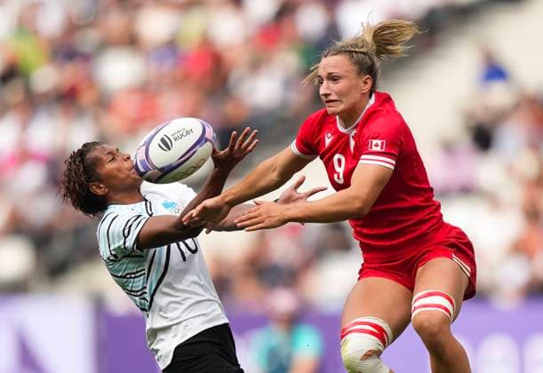 July 28, 2024, Paris, FRANCE: Canada forward Krissy Scurfield (9) battles for the loose ball against Fiji forward Laisana Likuceva (10) during second half Women rugby 7s rugby action at the Paris Summer Olympics in Paris, France on Sunday, July 28, 2024. Canada News - July 28, 2024  - ZUMAc35_ 20240728_zaf_c35_050 Copyright: xNathanxDenettex