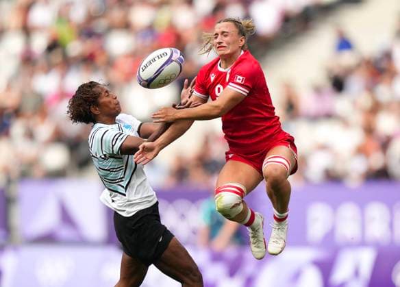 July 28, 2024, Paris, FRANCE: Canada forward Krissy Scurfield (9) battles for the loose ball against Fiji forward Laisana Likuceva (10) during second half Women rugby 7s rugby action at the Paris Summer Olympics in Paris, France on Sunday, July 28, 2024. Canada News - July 28, 2024  - ZUMAc35_ 20240728_zaf_c35_053 Copyright: xNathanxDenettex