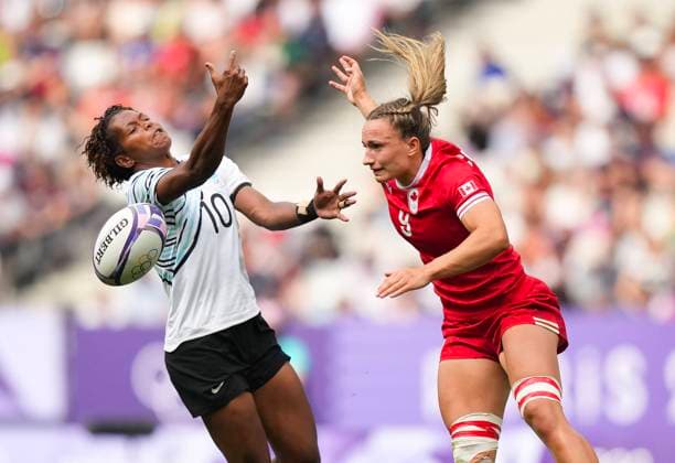 July 28, 2024, Paris, FRANCE: Canada forward Krissy Scurfield (9) battles for the loose ball against Fiji forward Laisana Likuceva (10) during second half Women rugby 7s rugby action at the Paris Summer Olympics in Paris, France on Sunday, July 28, 2024. Canada News - July 28, 2024  - ZUMAc35_ 20240728_zaf_c35_055 Copyright: xNathanxDenettex