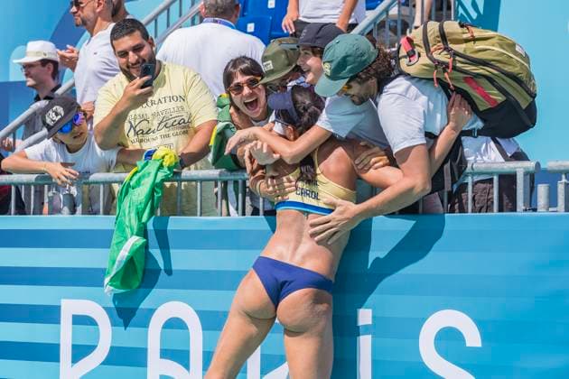 July 28, 2024, Paris, Ile de France, France: CAROLINA SOLBERG SALGADO (BRA) (1) and BARBARA SEIXAS DE FREITAS (BRA) (2) celebrate with friends and family after defeating Team Japan (JPN) in the Preliminary Phase - Pool E Women s Beach volleyball, Beachvolleyball at the Stade Tour Eiffel stadium during the 2024 Paris Summer Olympics in Paris, France. Paris France - ZUMAa161 20240728_oly_a161_085 Copyright: xWalterxArcex