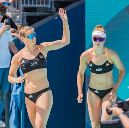 July 28, 2024, Paris, Ile de France, France: CINJA TILLMANN (GER) (2) is introduced to the fans as Team Germany play their Preliminary Phase - Pool C Women s Beach volleyball, Beachvolleyball match against Team France (FRA) at the Stade Tour Eiffel stadium during the 2024 Paris Summer Olympics in Paris, France. Paris France - ZUMAa161 20240728_oly_a161_105 Copyright: xWalterxArcex