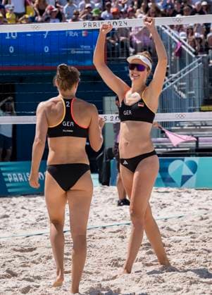 July 28, 2024, Paris, Ile de France, France: SVENJA MUELLER (GER) (1) and CINJA TILLMANN (GER) (2) celebrate after winning a serve during their Preliminary Phase - Pool C Women s Beach volleyball, Beachvolleyball match against Team France (FRA) at the Stade Tour Eiffel stadium during the 2024 Paris Summer Olympics in Paris, France. Paris France - ZUMAa161 20240728_oly_a161_131 Copyright: xWalterxArcex