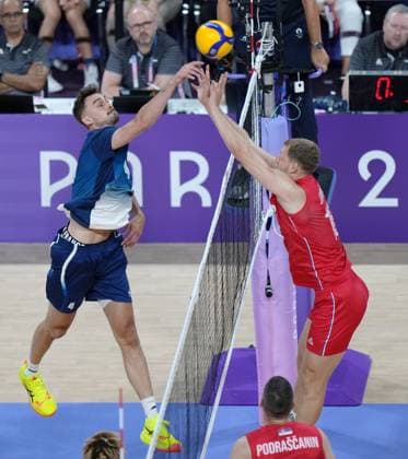 (240728) -- PARIS, July 28, 2024 -- Jean Patry (L) of France attacks during the volleyball men s preliminary round pool A match between France and Serbia at Paris 2024 Olympic Games, Olympische Spiele, Olympia, OS in Paris, France, July 28, 2024. ) (PARIS2024) FRANCE-PARIS-OLY-VOLLEYBALL LixGang 