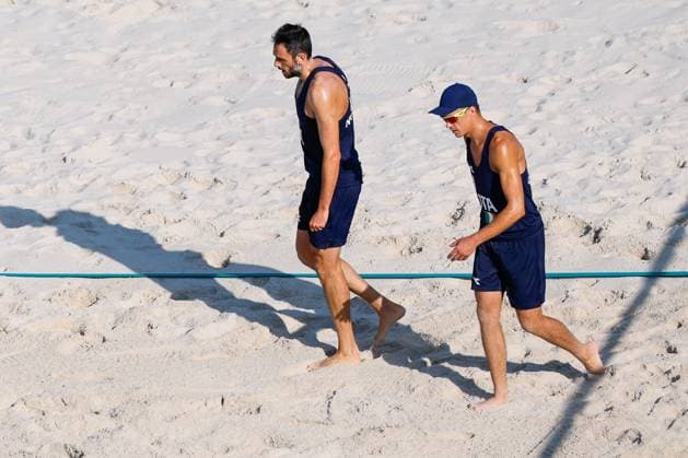 July 29, 2024, Paris, Paris, FRANCE: Samuele Cottafava of Italy and Paolo Nicolai of Italy compete against Izac Carracher of Australia and Mark Nicolaidis of Australia during Beach volleyball, Beachvolleyball Men s Preliminary Phase - Pool A match at Eiffel Tower Stadium - Centre Court during the Paris 2024 Olympics Games on July 29, 2024 in Paris, France. Paris FRANCE - ZUMAa181 20240729_zaa_a181_006 Copyright: xManuxReinox