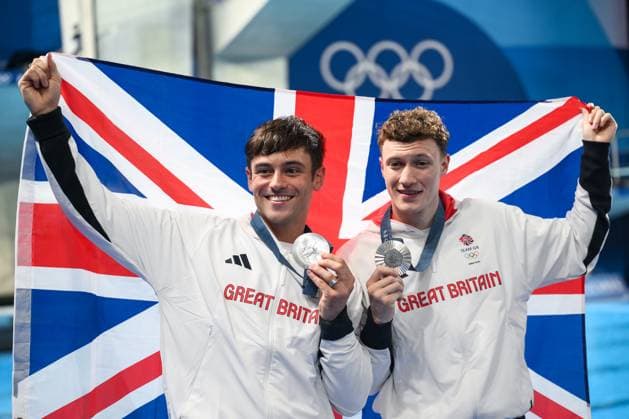 Thomas Daley and Noah Williams of Great Britain show the silver medal after competing in the diving 10m Platform Synchro Men Final during the Paris 2024 Olympic Games, Olympische Spiele, Olympia, OS at Aquatics Centre in Paris (France), July 29, 2024. Andrea Stacci