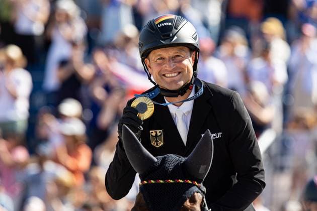 FRA, Olympic Games Paris 2024, Riding, Equestrian, 29 07 2024 Eventing Individual Jumping Final Olympic Champion Gold Michael Jung GER on Chipmunk FRH rides his victory lap with the medal FRA, Olympic Games Paris 2024, Riding, Equestrian 29 07 2024 Versaille Copyright: xEibner-Pressefoto RogerxBuerkex EP_RBE