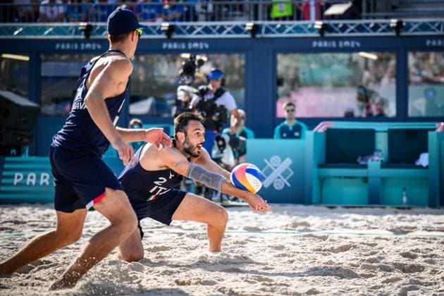 29 07 2024, Paris, Eiffel Tower Stadium Beach volleyball, Olympic Games, preliminary round Samuele Cottafava ITA , acceptance Paolo Nicolai ITA