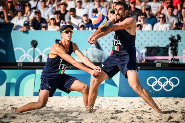 29 07 2024, Paris, Eiffel Tower Stadium Beach volleyball, Olympic Games, preliminary round acceptance Samuele Cottafava left and Paolo Nicolai ITA
