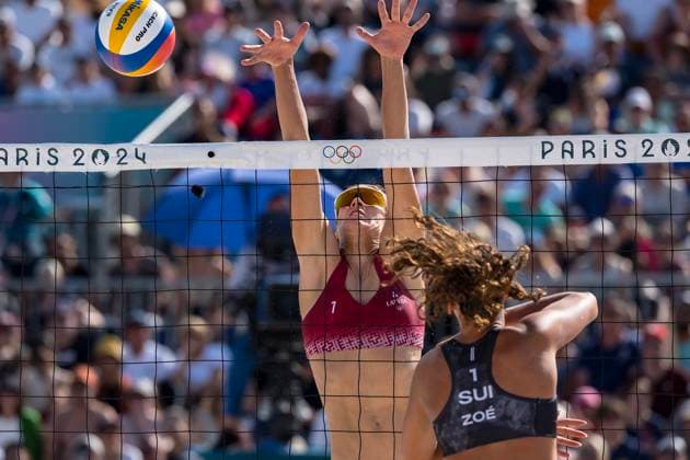 July 29, 2024, Paris, Ile de France, France: Latvia s Blocker TINA GRAUDINA (LAT) (1) and Latvia s Defender ANASTASIJA SAMOILOVA (LAT) (2) compete against Switzerland during their Preliminary Phase - Pool D Women s Beach volleyball, Beachvolleyball match at the Stade Tour Eiffel stadium during the 2024 Paris Summer Olympics in Paris, France.Switzerland Paris France - ZUMAa161 20240729_oly_a161_011 Copyright: xWalterxArcex