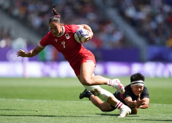 (240729) -- PARIS, July 29, 2024 -- Yan Meiling (R) of China vies with Florence Symonds of Cananda during the rugby sevens women s pool A match between China and Canada at Paris 2024 Olympic Games, Olympische Spiele, Olympia, OS in Paris, France, July 29, 2024. ) (PARIS2024) FRANCE-PARIS-OLY-RUGBY SEVENS LuixSiuxWai 