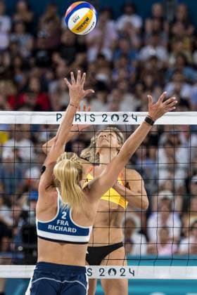 Olympic Games Beach Volleyball Paris 29 07 2024 Laura Ludwig of Germany attacks against Alexia Richard of France in the beach volleyball preliminary phase game France Placette Richard vs Germany Ludwig Lippmann pat the Olympic Games Paris 29 07 2024 Copyright: xBEAUTIFULxSPORTS OlafxRellischx