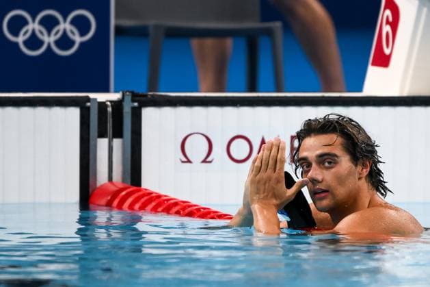 Thomas Ceccon of Italy reacts after winning the gold medal in the swimming 100m Backstroke Men Final during the Paris 2024 Olympic Games, Olympische Spiele, Olympia, OS at La Defense Arena in Paris (France), July 29, 2024. Andrea Stacci