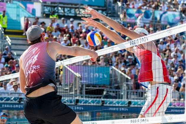 FRA, Summer Olympics Paris 2024, Beach Volleyball , Preliminary Round Group C, Match 3, Ehlers Wickler GER vs Bassereau Lyneel FRA 30 07 2024, Champ de Mars, Paris, FRA, Summer Olympics Paris 2024, Beach Volleyball , Preliminary Round Group C, Match 3, Ehlers Wickler GER vs Bassereau Lyneel FRA , in the picture Ehlers Nils GER scores the point against Bassereau Remi FRA nordphotoxGmbHx xStraubmeier nph00004