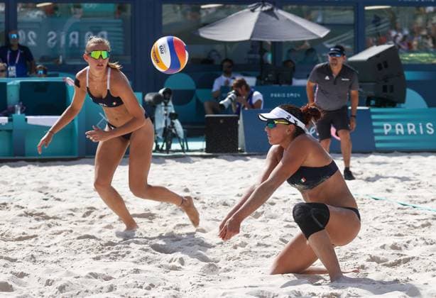 FRANCE, PARIS - JULY 30, 2024: Valentina Gottardi (L) and Marta Menegatti of Italy compete in a women s Pool A - Preliminary Phase Beach volleyball, Beachvolleyball match at the 2024 Summer Olympic Games, Olympische Spiele, Olympia, OS by the Eiffel Tower on the Champ de Mars. Alexander Shcherbak TASS  72534191