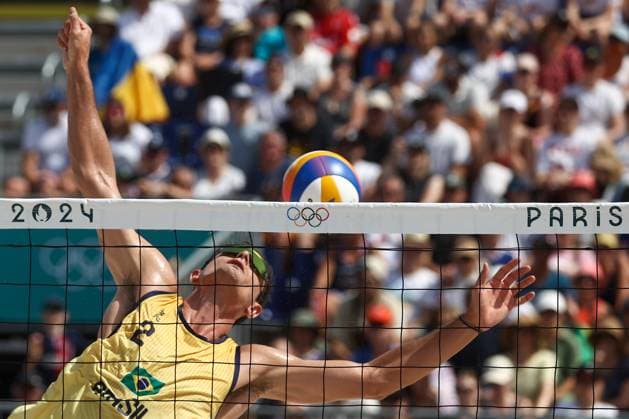 FRANCE, PARIS - JULY 30, 2024: Andre Loyola Stein of Brazil competes in a men s Pool D - Preliminary Phase Beach volleyball, Beachvolleyball match between Brazil and Cuba at the 2024 Summer Olympic Games, Olympische Spiele, Olympia, OS by the Eiffel Tower on the Champ de Mars. Alexander Shcherbak TASS  72537874
