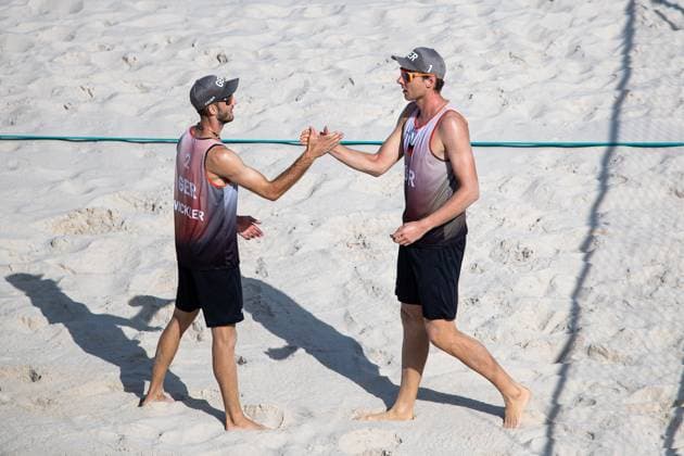 FRA, Olympic Games Paris 2024, Beach Volleyball Mens Preliminary Round Group C, 30 07 2024 Ehlers Wickler FRA vs Bassereau Lynell FRA high-five Ehlers, Wickler FRA, Olympic Games Paris 2024, Beach Volleyball Mens Preliminary Round Group C 30 07 2024 Paris Copyright: xEibner-Pressefoto RogerxBuerkex EP_RBE