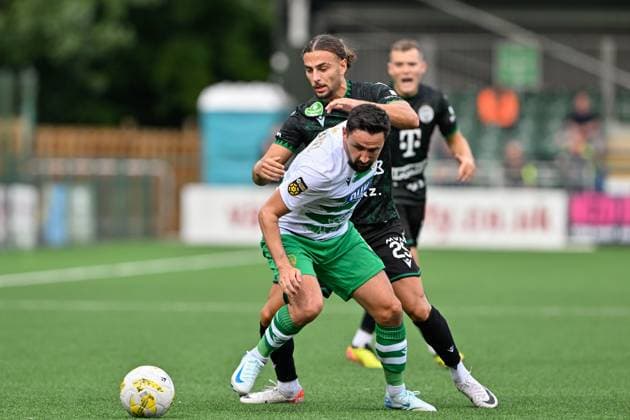 UEFA Champions League - Second Qualifying Round The New Saints v Ferencvaros Ryan Brobbel of The New Saints holds off Äaebrails Makreckis of Ferencvaros during the UEFA Champions League Second Qualifying Round match The New Saints vs Ferencvaros at Park Hall Stadium, Oswestry, United Kingdom, 30th July 2024 (Photo by Cody Froggatt News Images) Oswestry Park Hall Stadium Shropshire United Kingdom Copyright: xCodyxFroggatt NewsxImagesx
