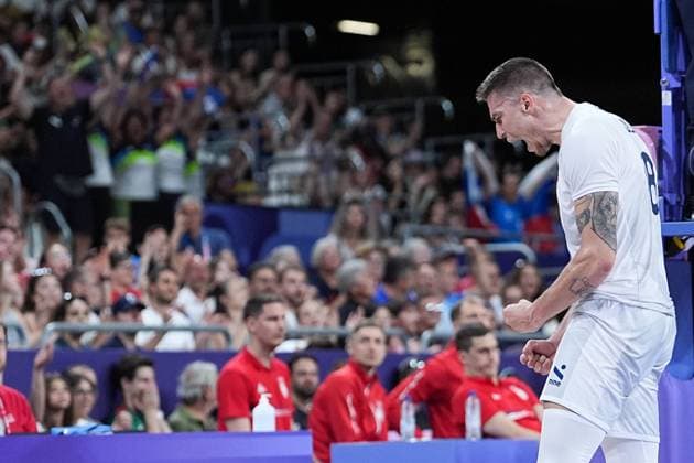(240730) -- PARIS, July 30, 2024 -- Klemen Cebulj of Slovenia celebrates after scoring during the men s preliminary round pool A match of volleyball between Slovenia and Serbia at the Paris 2024 Olympic Games, Olympische Spiele, Olympia, OS in Paris, France, July 30, 2024. ) (PARIS2024)FRANCE-PARIS-OLY-VOLLEYBALL JuxHuanzong 