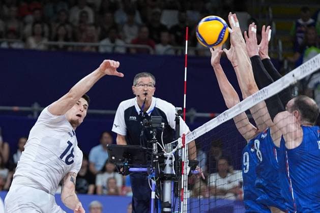 (240730) -- PARIS, July 30, 2024 -- Klemen Cebulj (1st L) of Slovenia spikes the ball during the men s preliminary round pool A match of volleyball between Slovenia and Serbia at the Paris 2024 Olympic Games, Olympische Spiele, Olympia, OS in Paris, France, July 30, 2024. ) (PARIS2024)FRANCE-PARIS-OLY-VOLLEYBALL JuxHuanzong 