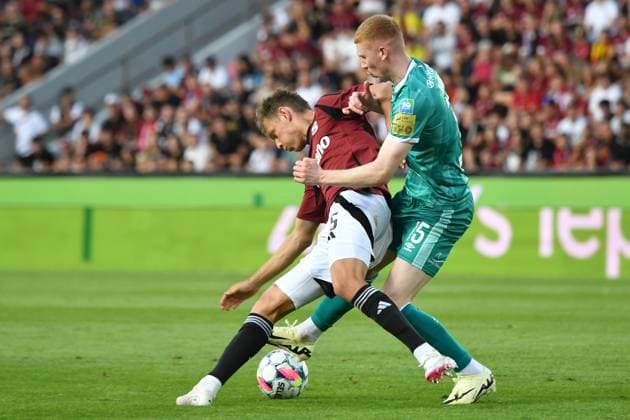 July 30, 2024, Prague, Czech Republic: MATHIAS ROSS of Sparta Praha (L) fight for ball with Shamrock Rover s DARRAGH NUGENT (R) during second qualifying round UEFA Champions League, 2nd leg match at July 30, 2024, in Prague in the Czech Republic. 6-2 Sparta Praha win. Prague Czech Republic - ZUMAr156 20240730_aap_r156_012 Copyright: xSlavekxRutax